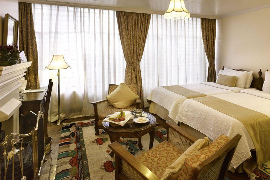 Privatreise Indien, Schlafzimmer, The Elgin, A Heritage Hill Resort & Spa, Darjeeling, Indien